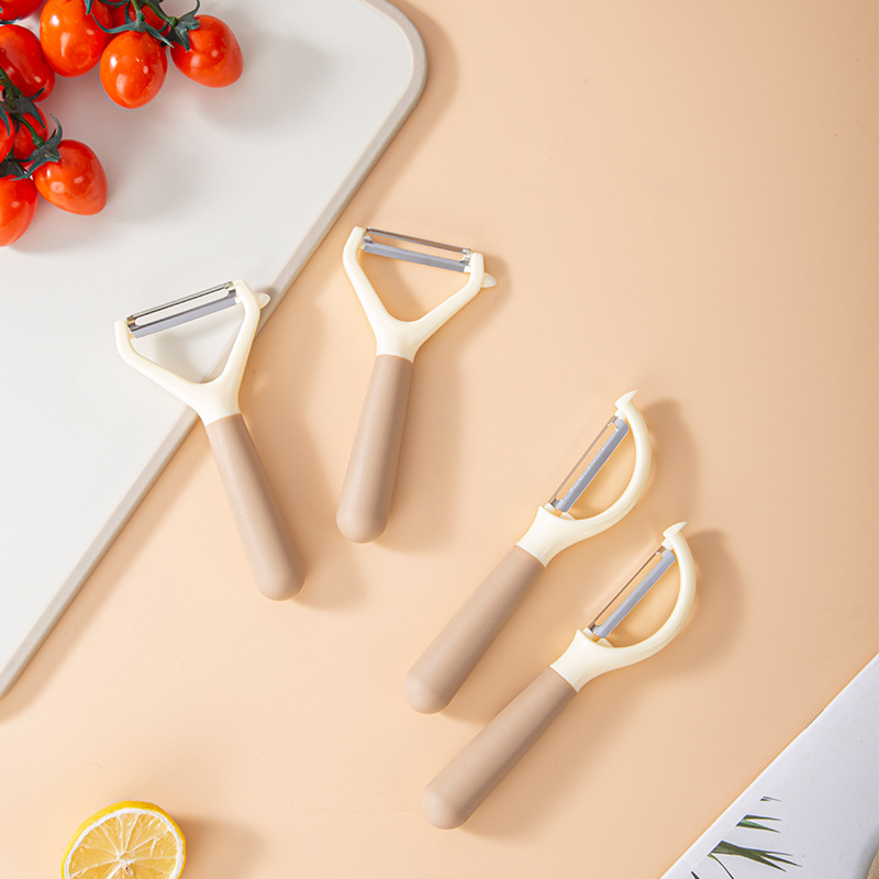 Manufacturer stainless steel peeling plane household kitchen peeler vegetable, fruit and potato peeling plane two-color handle peeling knife
