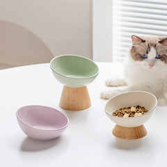 陶磁器の斜めの口の斜めの辺の碗のペットの用品の猫の犬の碗の食糧の碗の食器の飲食の碗は高くて足の保護の首をひっくり返すことを防ぎます。
