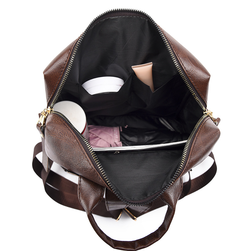 Mochila de cuero suave casual de nuevo estilo al por mayor transfronterizo 2023 Mochila de computadora de viaje multifuncional de doble uso de moda femenina