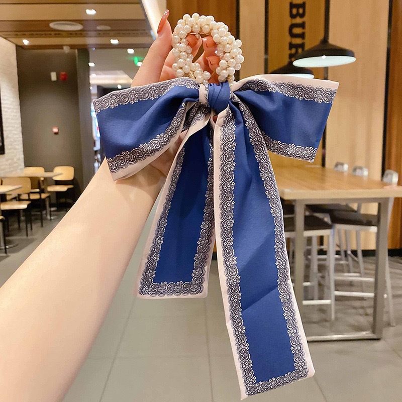 Banda de pelo de bufanda de seda para mujer corbata de pelo fino de verano de perlas cinta de arco Hada cuerda de pelo de todo fósforo estilo coreano accesorios para el cabello al por mayor