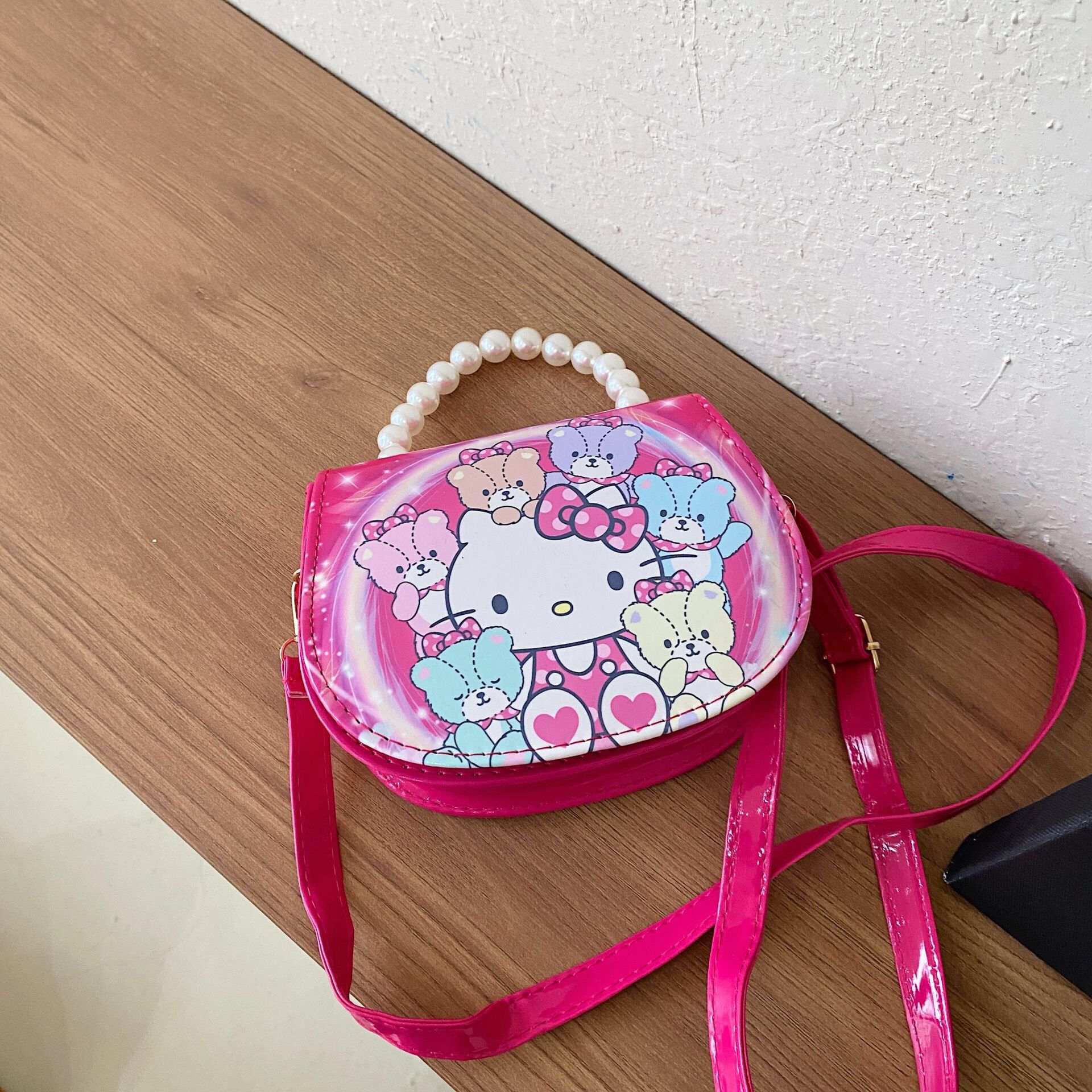 2024 nueva bolsa de hombro para niños princesa Elsa dibujos animados Yue Gui perro coreano nicho perla bolsa de mano inclinada