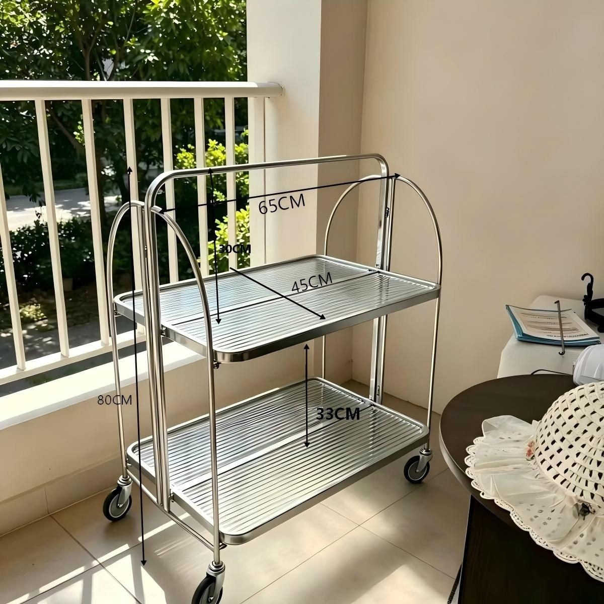 Used folding mobile glass trolley, beverage and food cart, trendy Instagram-style transparent glass side table