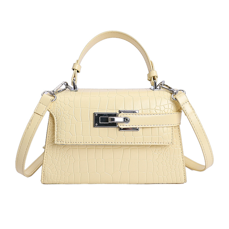 Bolsos de textura de nicho de cocodrilo de alta calidad, bolsos de mujer 2026 nuevos bolsos de mochila, bolsos de bloqueo de moda