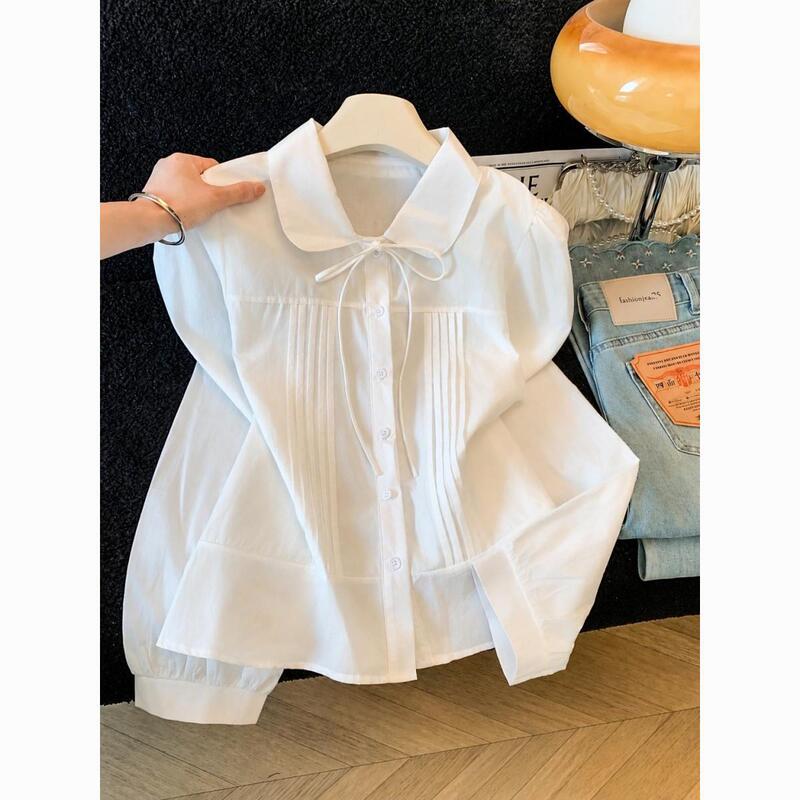 2026 Autumn College Style Doll Collar Long Sleeve Solid Color Blouse with Bow Tie, Pleated Puff Sleeves, and Off-Shoulder Design 2026 Autumn College Style Doll Collar Long Sleeve Solid Color Blouse with Bow Tie, Pleated Puff Sleeves, and Off-Shoulder Design
