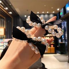 韓国東大門ネット赤皮筋真珠髪ひもヘアリング蝶結びひも義烏卸売りメーカーの商品ソース飾り