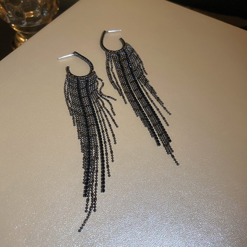 Pendientes de borla de hoja de circón largo de viento de metal con aguja de plata Pendientes de moda exquisita Pendientes de lujo ligero de viento frío