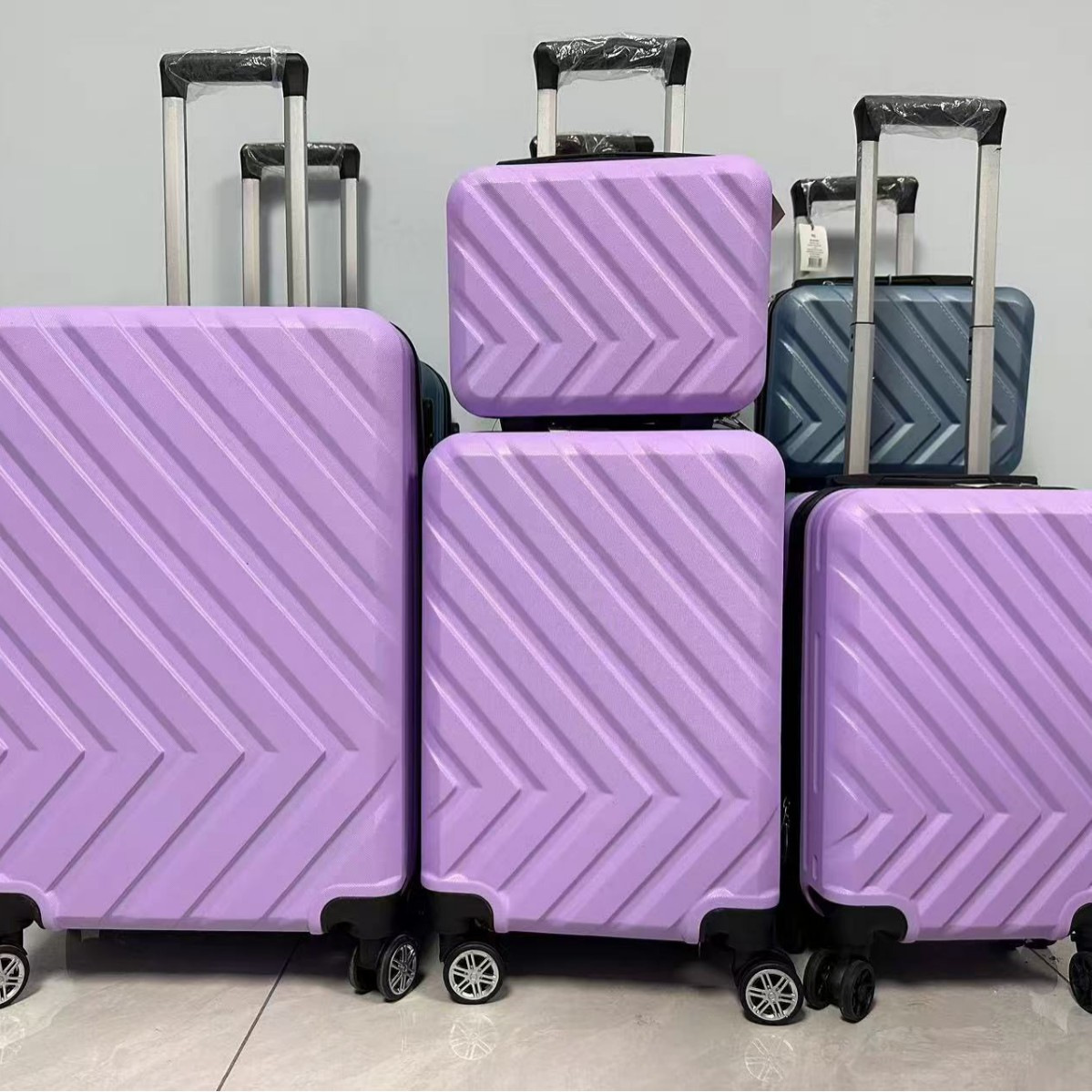 Twill simple luggage four-piece set, password-locked trolley case, large capacity, universal wheels, gift travel case, manufacturer wholesale
