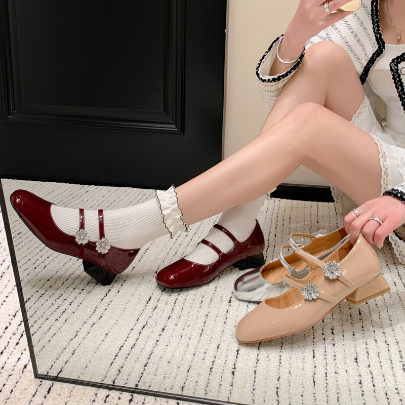 Romantic and delicate Mary Jane shoes with rhinestones made of…