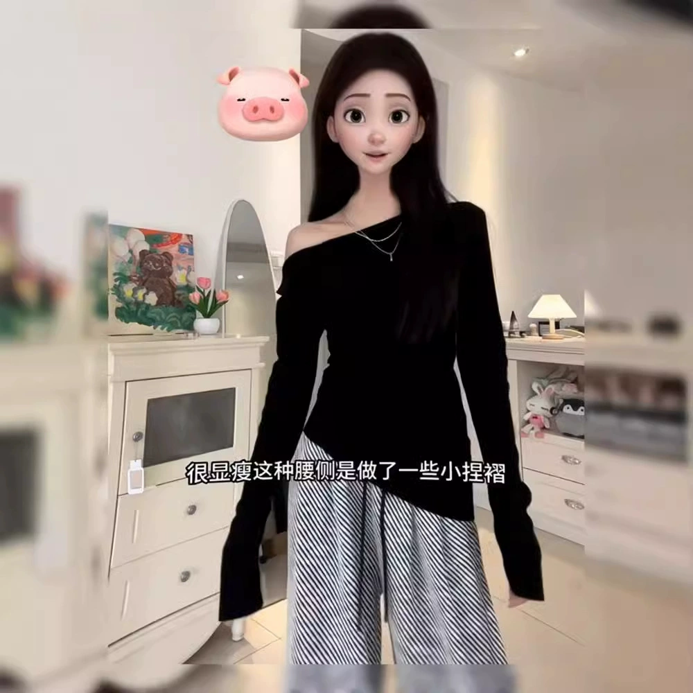 Французская черная футболка с длинными рукавами на плече