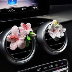 クチナシの花の車の香薫の車のエアコンの噴出口は桂花の輪を飾って香石の車内の装飾品を広げます。