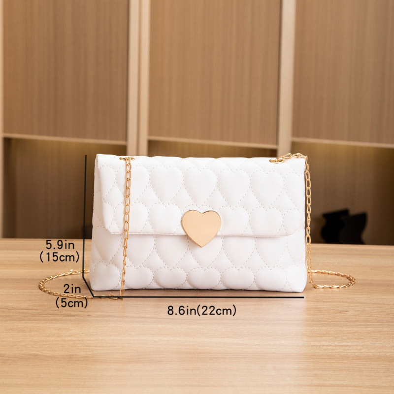 Bolsa de hombro de cerradura de corazón de melocotón comercio exterior al por mayor 2025 primavera y verano nuevo bolso multifuncional de mujer, bolso de mujer interior