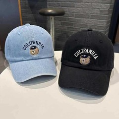 野球帽の女性の春の夏の韓国版の青年のレジャー風の熊の顔のアルファベットの刺繍の純綿の曲がったひさしの帽子のカウボーイの青