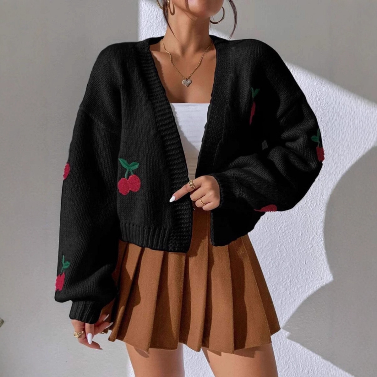 Nuevo suéter de bordado de cereza tridimensional transfronterizo de otoño y invierno de Europa y Estados Unidos. ropa de mujer. Cardigan de punto suelto sin hebilla.
