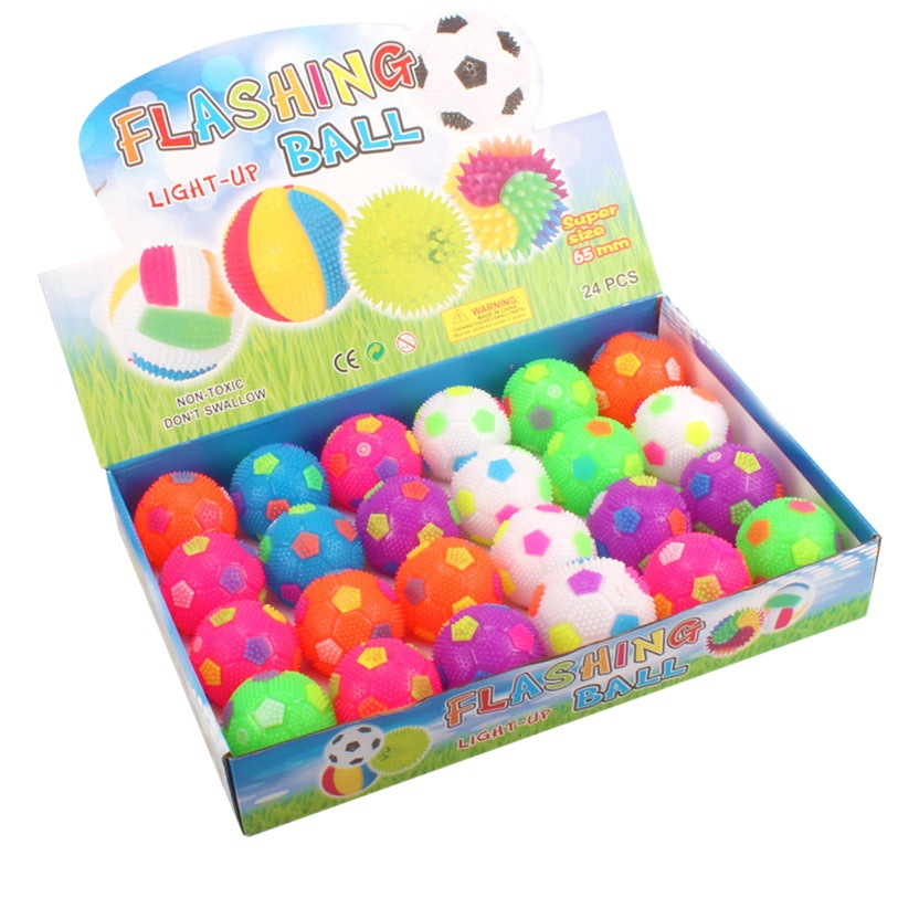 Nueva bola elástica de voleibol luminosa Bola de masaje de fútbol luminoso silbato Bola de púas puesto luminoso suministro al por mayor