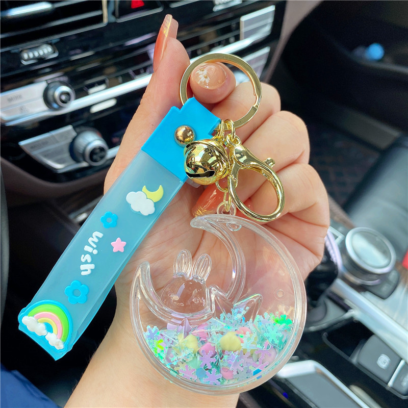 Red de aceite creativo rojo luminoso copo de nieve estrella Luna conejo Quicksand botella llavero femenino lindo Quicksand botella colgante bolsa adornos