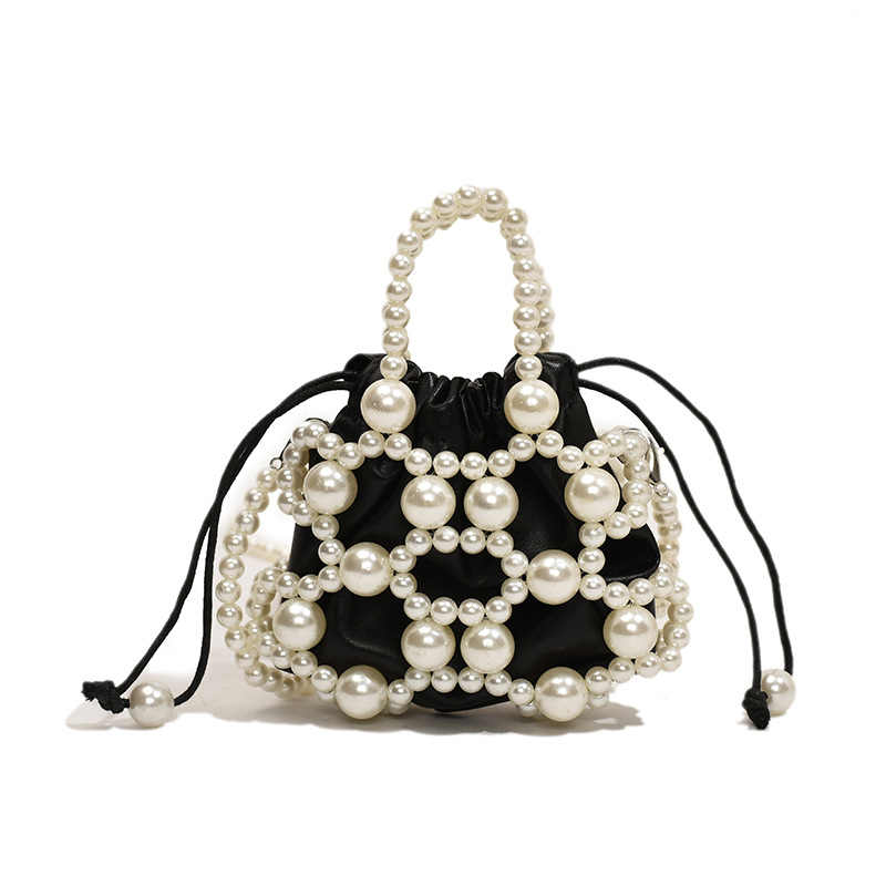 Versión coreana del nuevo estilo de verano bolso de mensajero para niños lindo perla bolso para niños y niñas mini bolso de hombro para niñas de estilo occidental