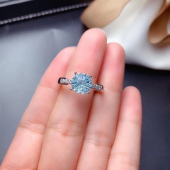 生放送の新型の経典の牛の頭の金は輸入の莫桑のダイヤモンドの指輪のpt950青いトパの花火をまねて口の指輪を切ります。