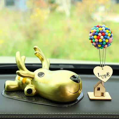 Car ornaments: Car Interior Decoration Ceramic Deer - golden-deer-flying-house-balloon-water-drops-anti-slip-mat