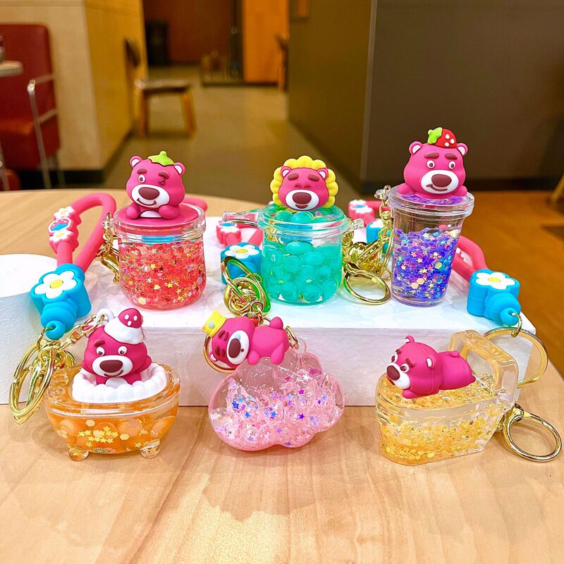 Luminous strawberry bear in oil quicksand bottle key chain liquid cartoon doll bear pendant grab doll machine gift Luminous strawberry bear in oil quicksand bottle key chain liquid cartoon doll bear pendant grab doll machine gift