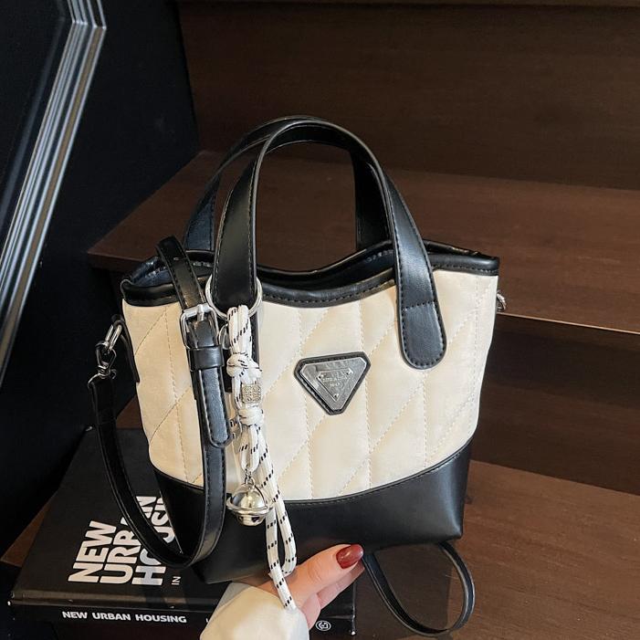Bolso de cubo portátil de diamante de fuego súper caliente para mujer 2025 nueva tendencia bolso de hombro de todo fósforo bolso de mensajero de moda de nicho transfronterizo