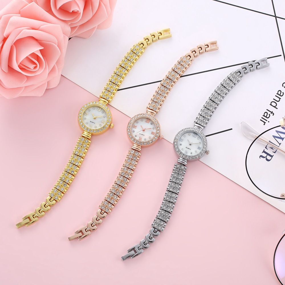 Nueva moda pequeño dial de diamante correa de acero de diamante reloj de mujer