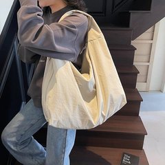 大容量トートバッグ女性の新しいシンプルな無地多用途ショルダーバッグ韓国スタイル怠惰なスタイルの通勤ハンドバッグ