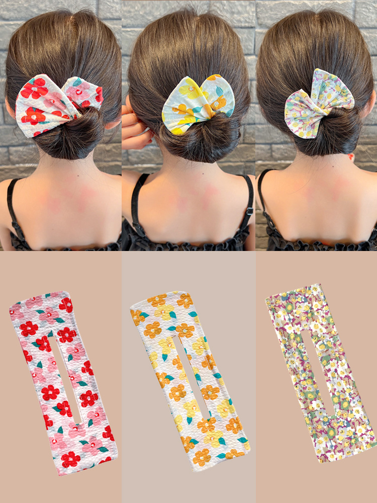 可愛蝴蝶結兒童魔術扭扭夾盤發器女童丸子頭神器寶寶捲髮髮夾發卡