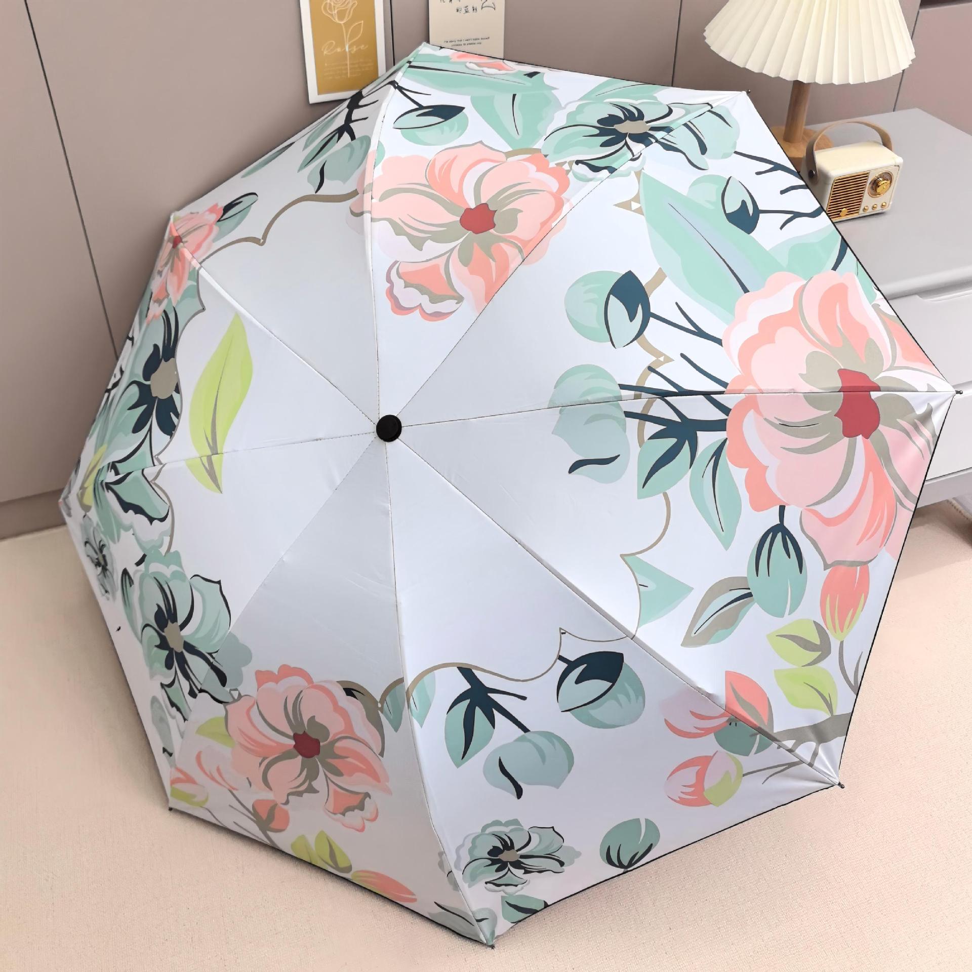 Sombrilla, de doble propósito para sol y lluvia, serie de flores, sombrilla plegable con revestimiento negro para protección solar.