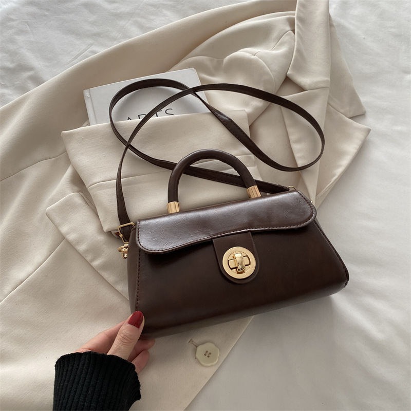 Retro simple bolso de mujer 2024 otoño invierno nuevo bolso de mano cuadrado de estilo exterior versátil alta textura mochila