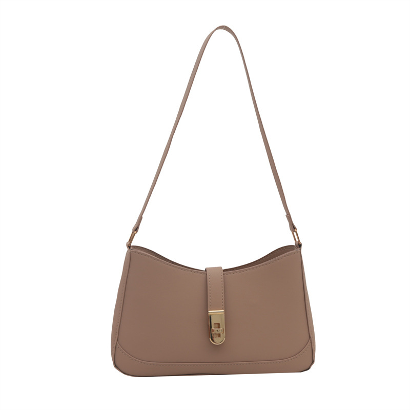 El popular diseño de nicho de este año 2024 nuevo bolso de mensajero de color sólido de moda bolso de hombro de moda bolso de axila con cerradura de estilo occidental