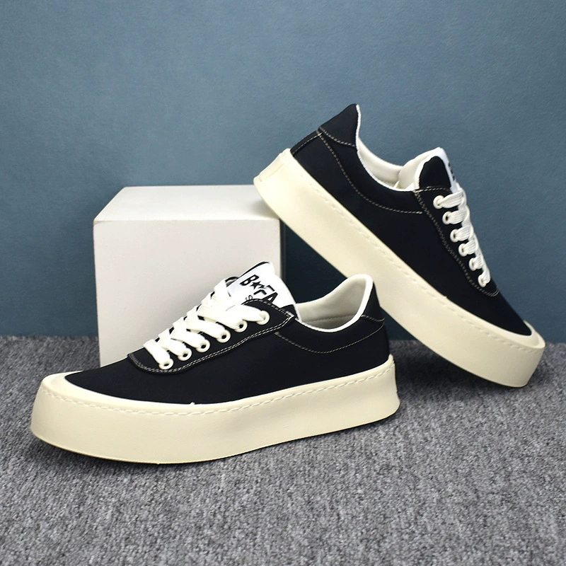 Весенние дышащие повседневные мужские туфли с толстой подошной корейской версией тренда с низким верхом ткани универсальные кроссовки маленькие белые туфли 2024 новые