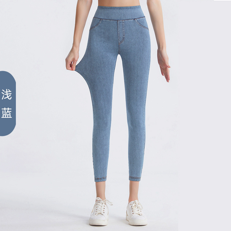 Vaqueros de imitación de cintura alta europeos y americanos para mujeres ajustadas, caderas delgadas, abdomen elástico, pantalones casuales de fitness de doble bolsillo