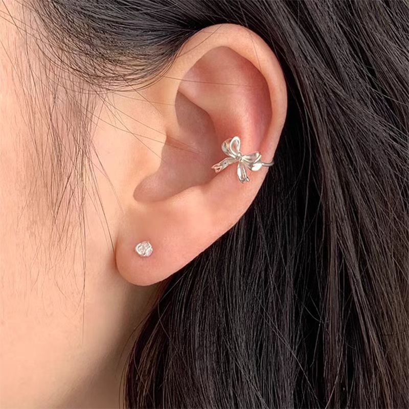 Ins arco de arco de hueso de oreja clips dulce y fresco elegante suave clips de orejas de diseño sensación de novedad accesorios pendientes sin agujeros de orejas