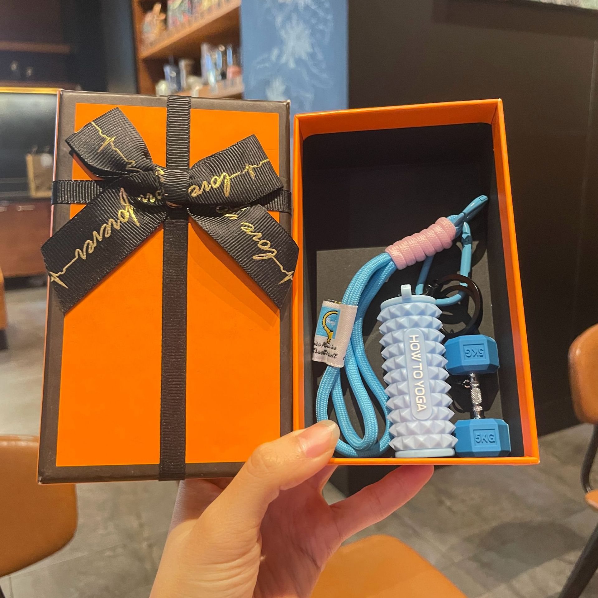 Blue set for yoga from foam, orange gift box