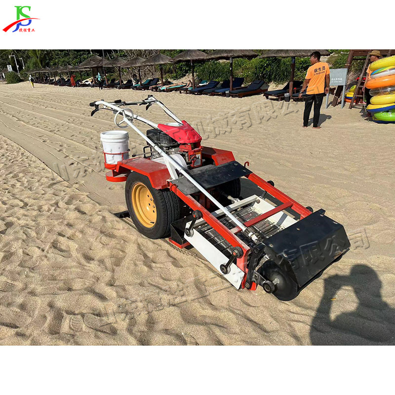 Equipo hidráulico de limpieza de playa de la isla de Hainan rastrillo de grava de arena tracción camión de recolección de basura de playa