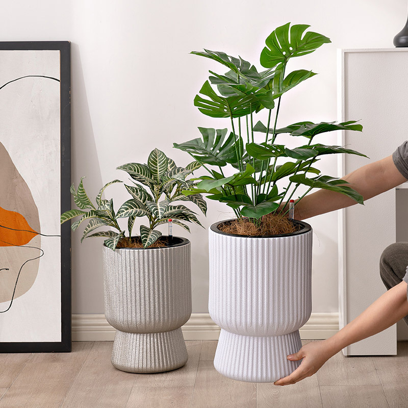 Nuevo nórdico asiático alto pie plástico imitación de cerámica simple creativa sala de estar orquídea mariposa casera maceta verde