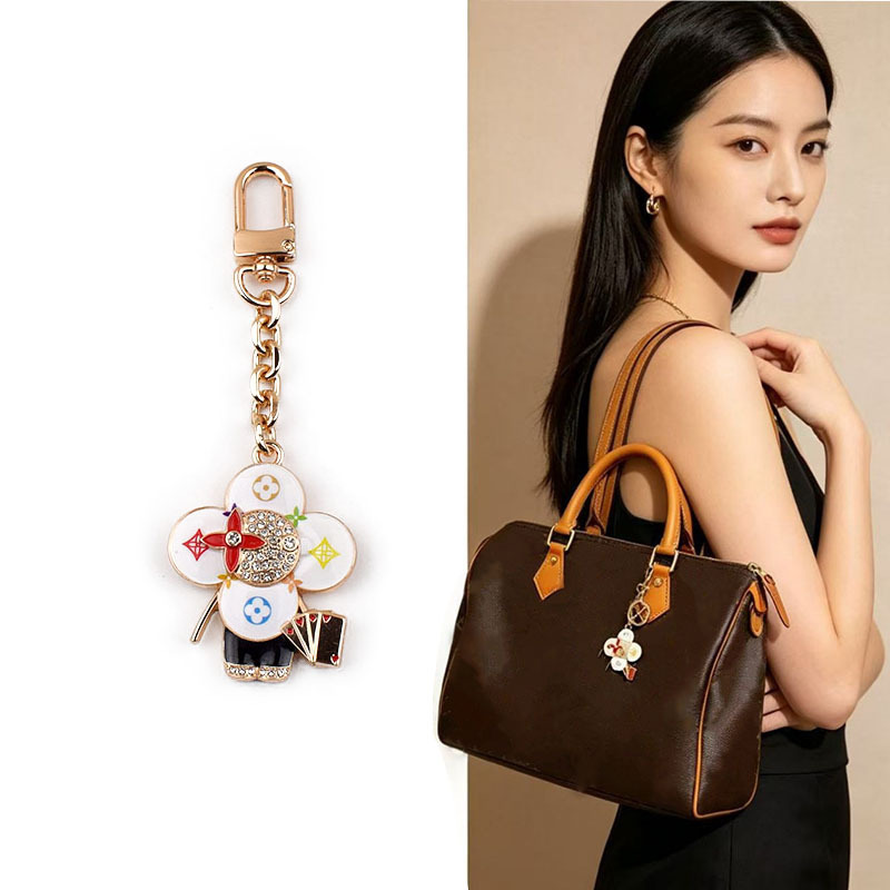 Suitable for LV bags, black and white tricolor Vivienne charm chain, transformation of monogram bag decoration, four-leaf clover pendant accessories