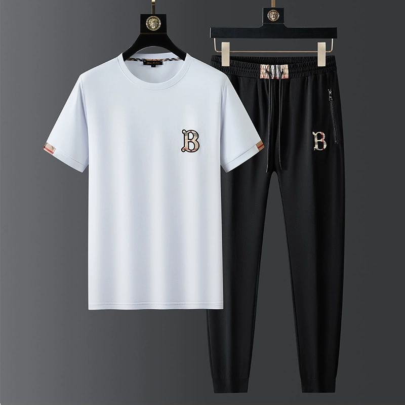 Легкий роскошный мужской костюм из мерсеризованного хлопка, модный европейский костюм с вышивкой, летний мужской повседневный спортивный комплект из двух предметов с круглым вырезом и короткими рукавами