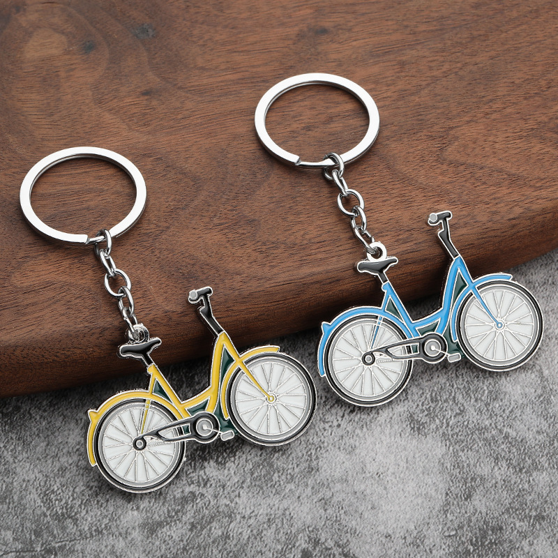 Factory direct cross-border fashion dynamic small bicycle metal key chain pendant student bicycle small gift pendant