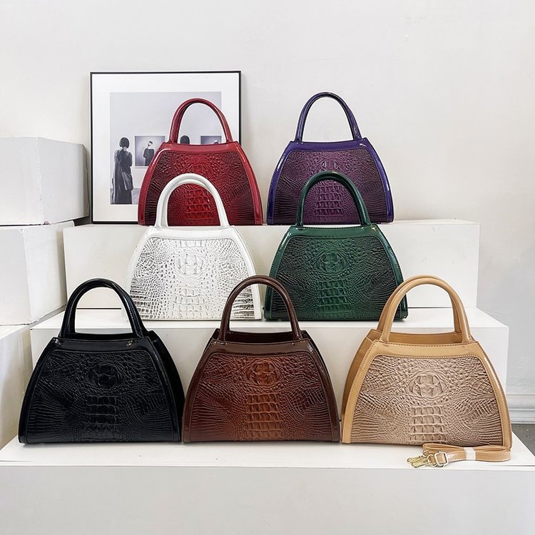 Comercio exterior al por mayor 2023 nuevo estilo retro tendencia bolso de mujer bolso de mensajero de un solo hombro de gran capacidad bolso de color a juego