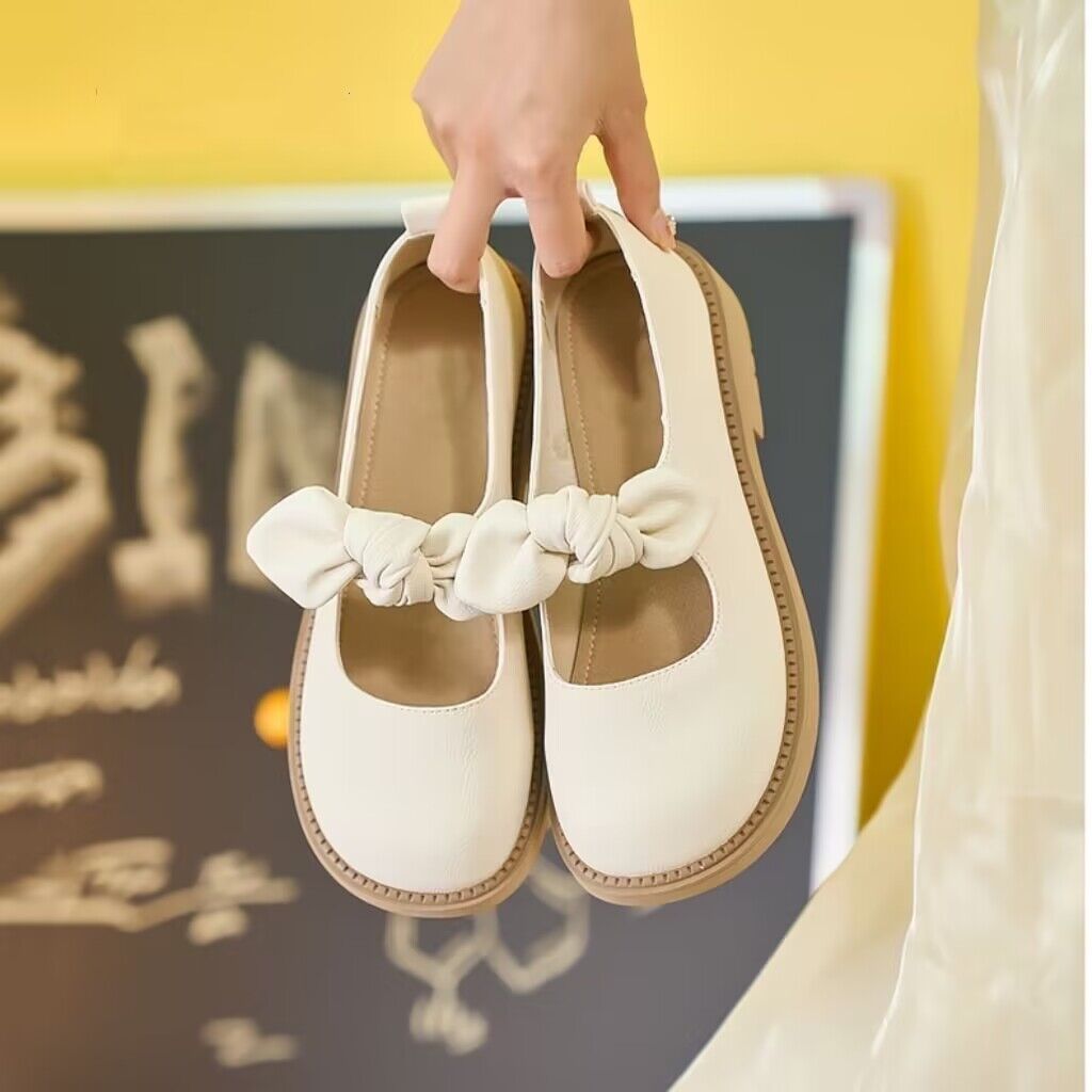 Zapatos de cuero retrógrados franceses para mujeres 2026 nuevo arco superficial verano perezoso zapatos de moda de una sola pie