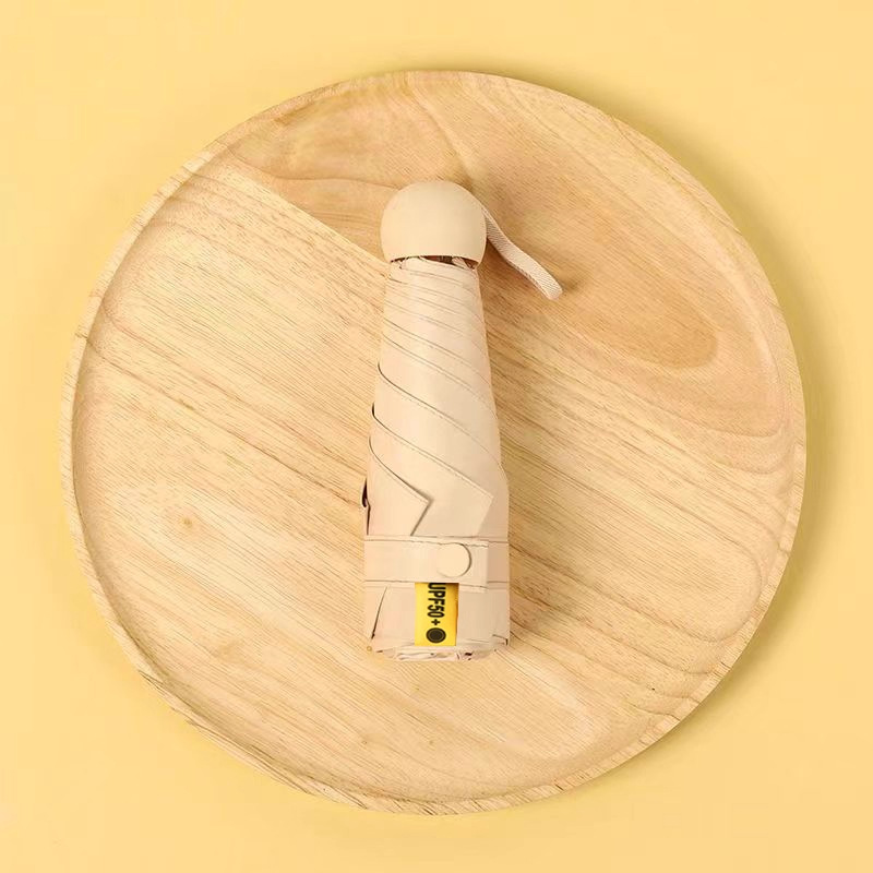 50% de descuento sol y lluvia paraguas de protección solar paraguas de sol UV portátil compacta cápsula sombrilla personalizada