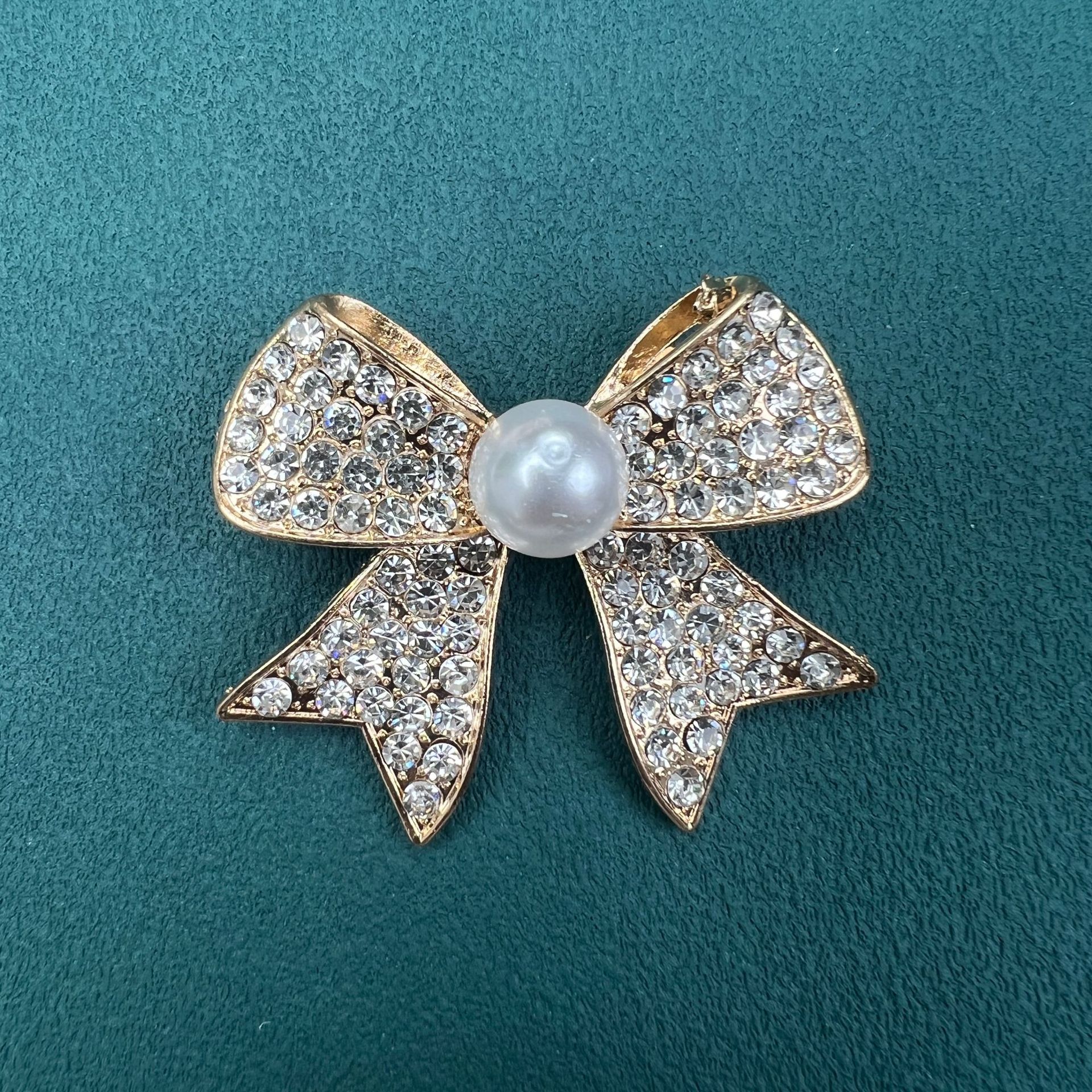 Bowknot anti exposure brooch high end chest no sew coat suit buckle versatile clothing accessories fixed pin_voghion.com