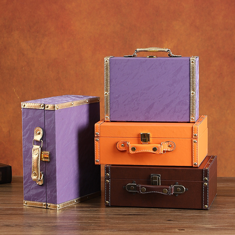 Handheld capacious storage box for traveling