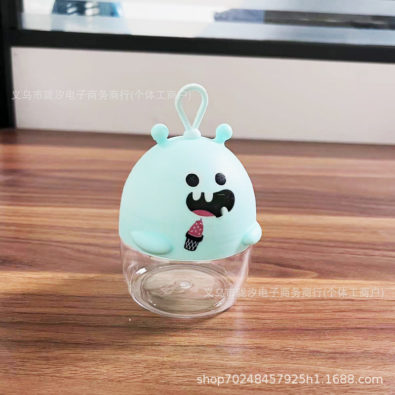 Monstruo de dibujos animados caramelo transparente botella de plástico PET grado alimenticio frijol soluble de color de arcilla embalaje tarro animal en forma de sello