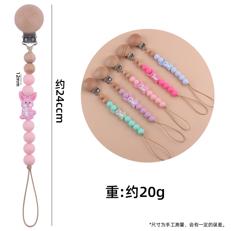 Nuevo bebé suministros dibujos animados conejo mordedor creativo lindo DIY mordedura molar pezón cadena anti-gota cuerda de la cadena