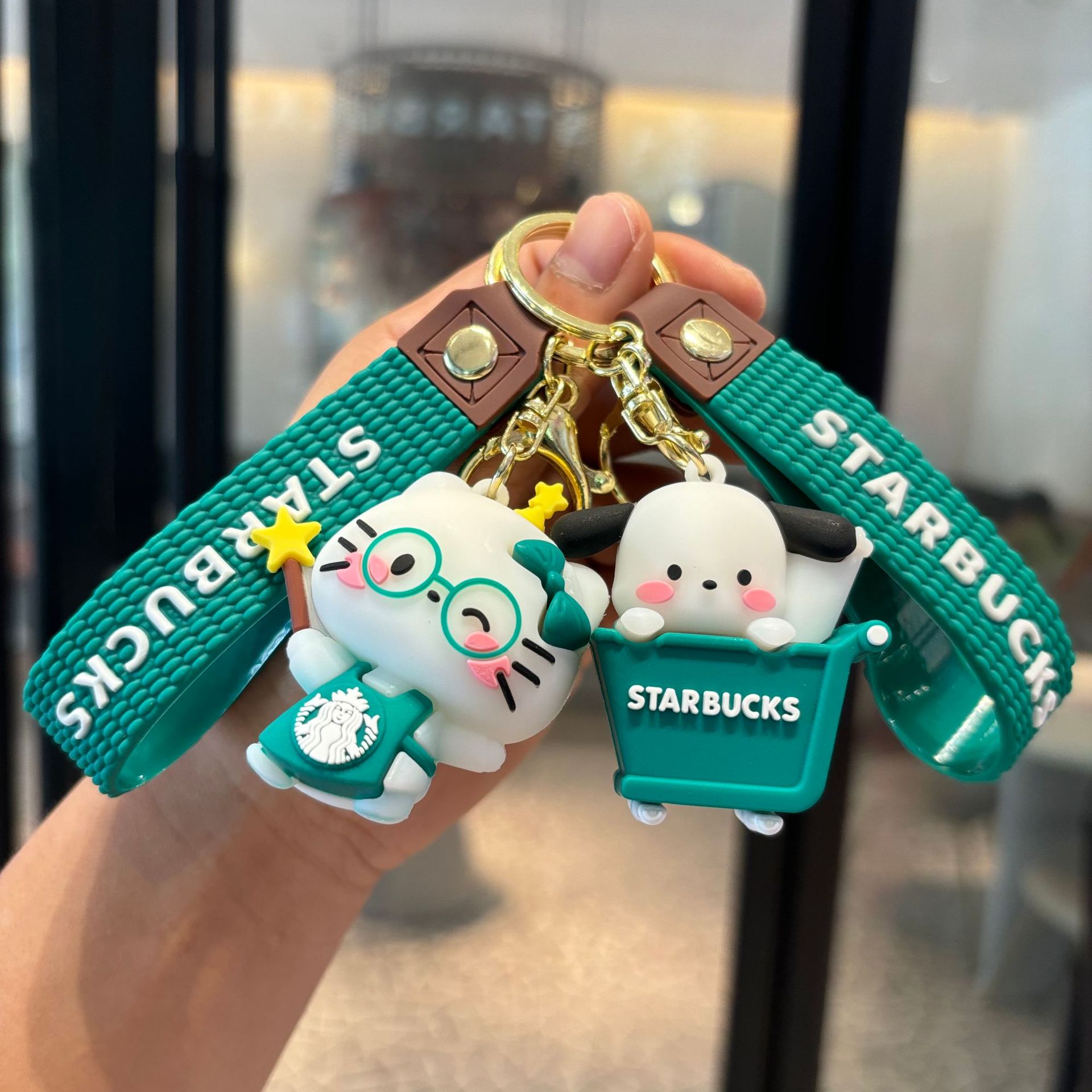 Sanrio Starbucks llaveras kt gato pacha perro muñeca colgante atrapar máquina accesorios pequeños regalos al por mayor