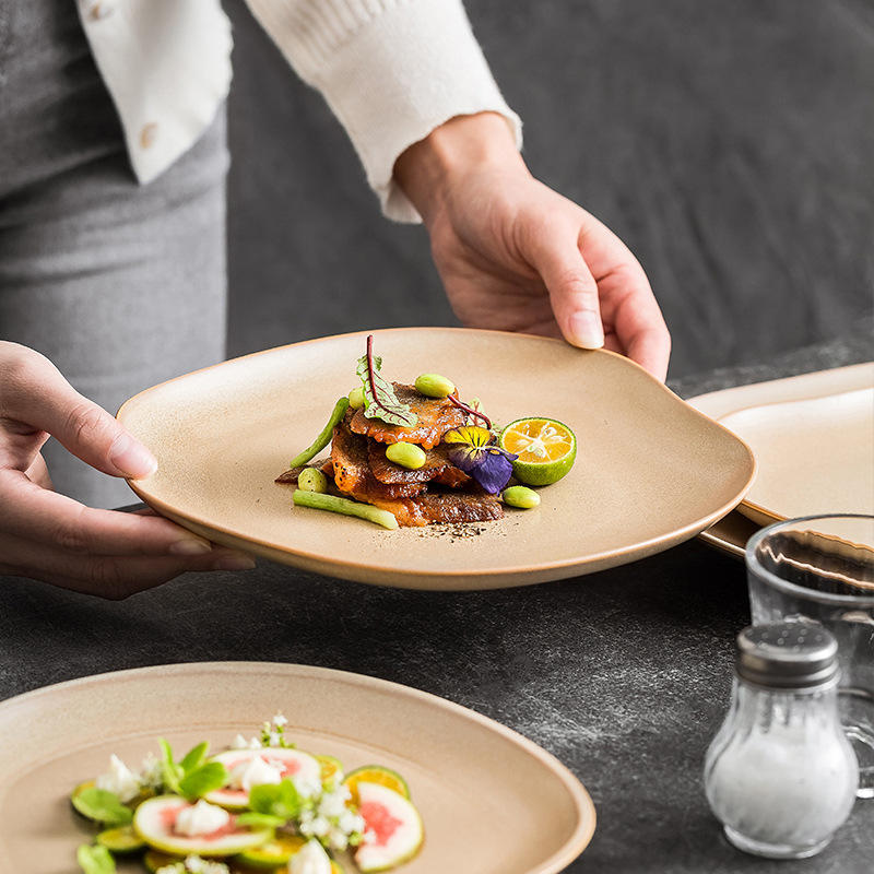 Factory creative ceramic special-shaped plate high-end restaurant irregular dessert plate light luxury kiln Brown plate 2024