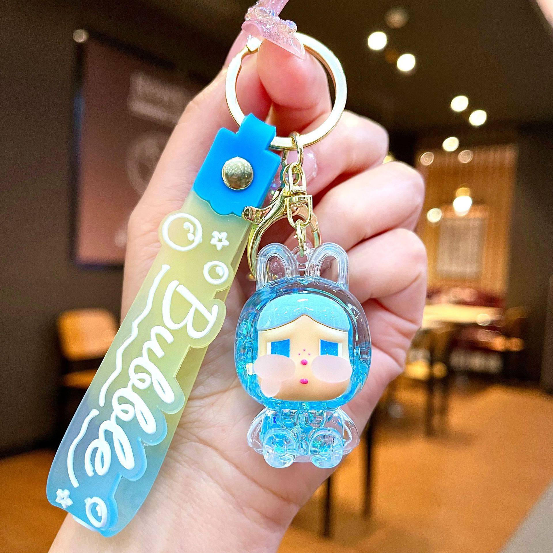 Llavero red acrílico con arena flotante