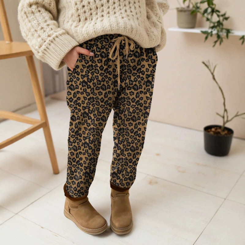 European and American style casual leopard print sweatpants with elastic drawstring, high waist, cuffed ankles, and side pockets European and American style casual leopard print sweatpants with elastic drawstring, high waist, cuffed ankles, and side pockets